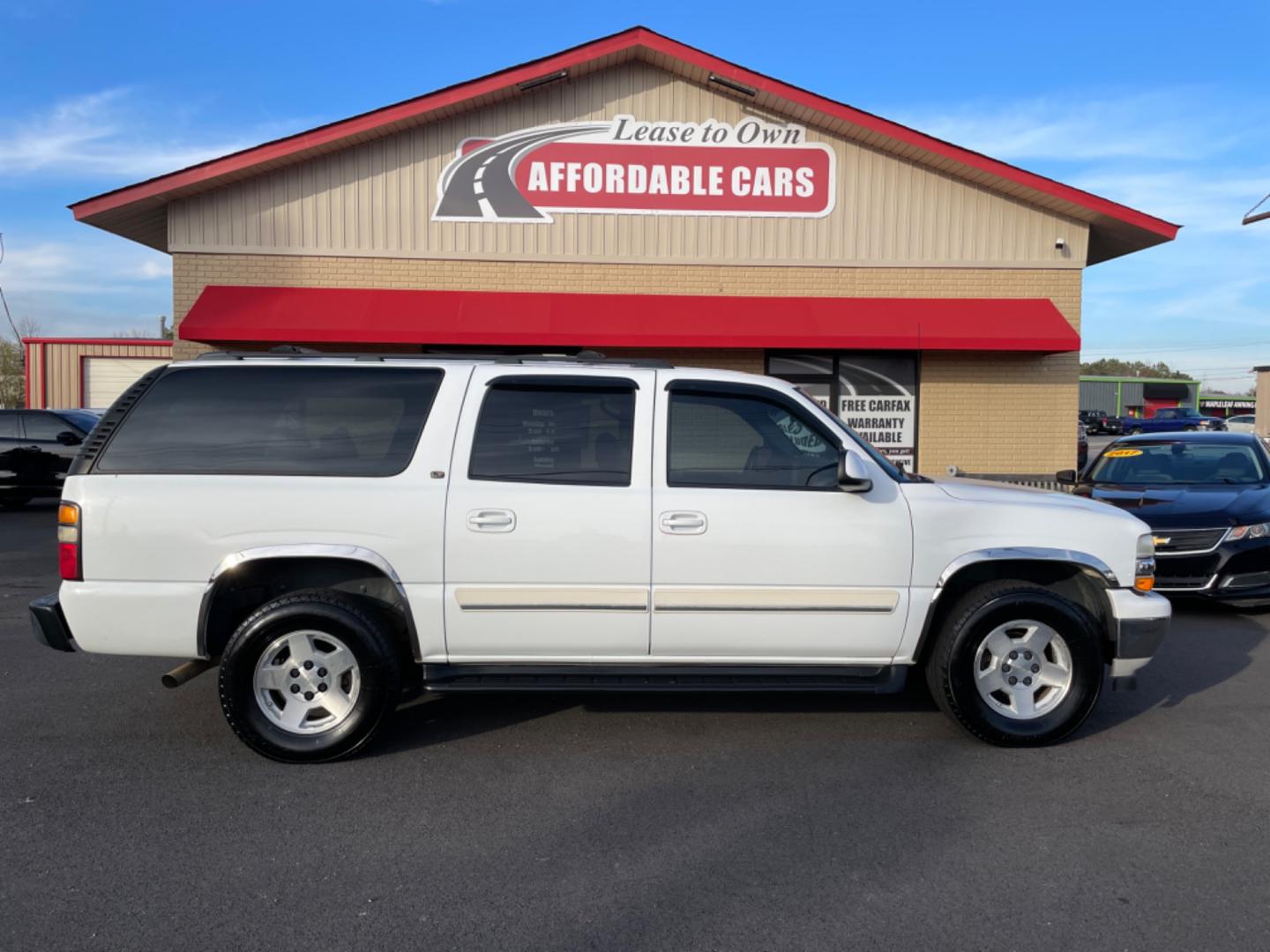 2006 White Chevrolet Suburban 1500 (1GNEC16Z16J) with an V8, 5.3 Liter engine, Automatic transmission, located at 8008 Warden Rd, Sherwood, AR, 72120, (501) 801-6100, 34.830078, -92.186684 - Photo#0